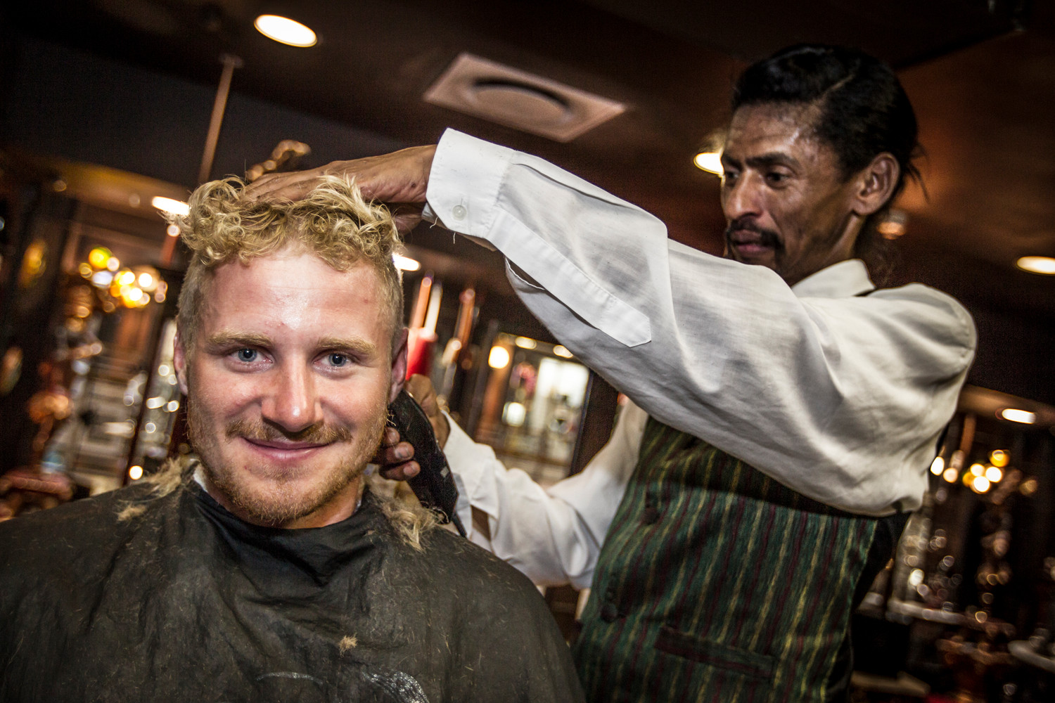 November 8, 2014. Team Vestas Wind's youngest guys get a shave, a haircut and quite an experience at a local barber shop in Cape Town.