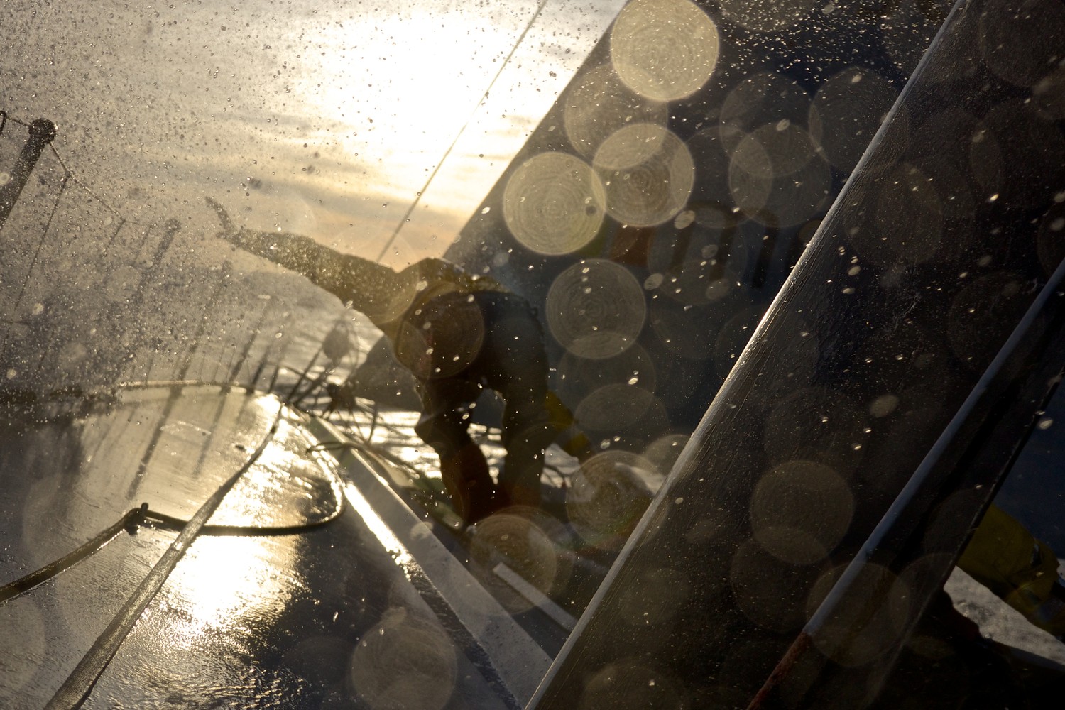 November, 2014. Leg 2 onboard Team Brunel. Moving the bagged sails across the foredeck to counter balance the boat